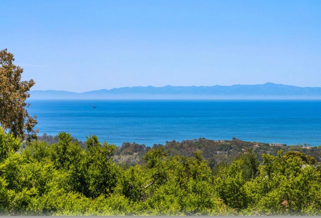 a view of lake with mountain