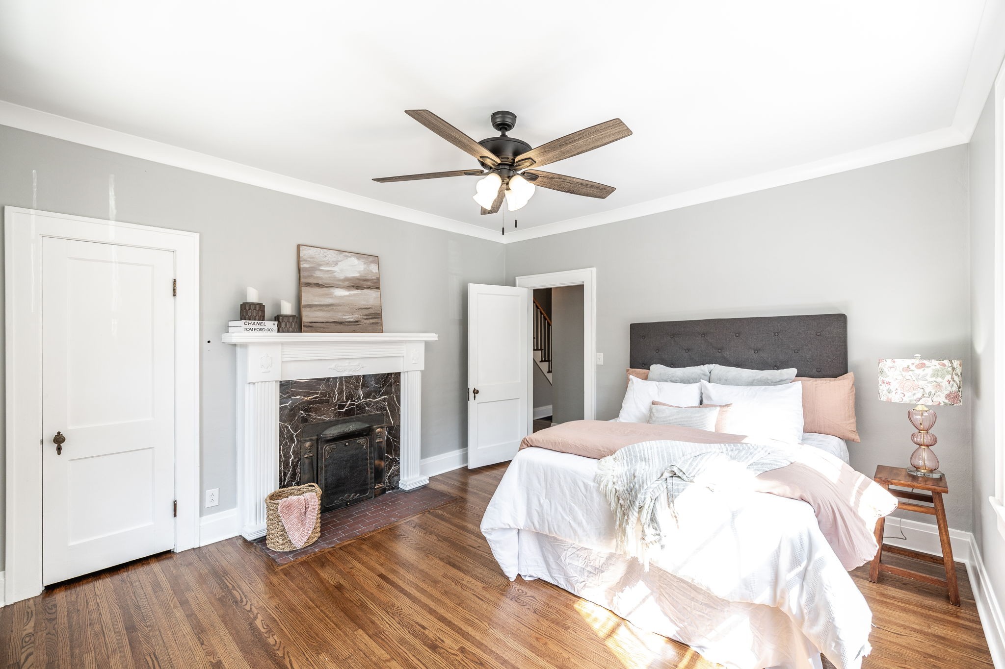 311 North Walnut Street Springfield, TN 37172 - Photo 29 of 79 a bedroom with a bed and a fireplace