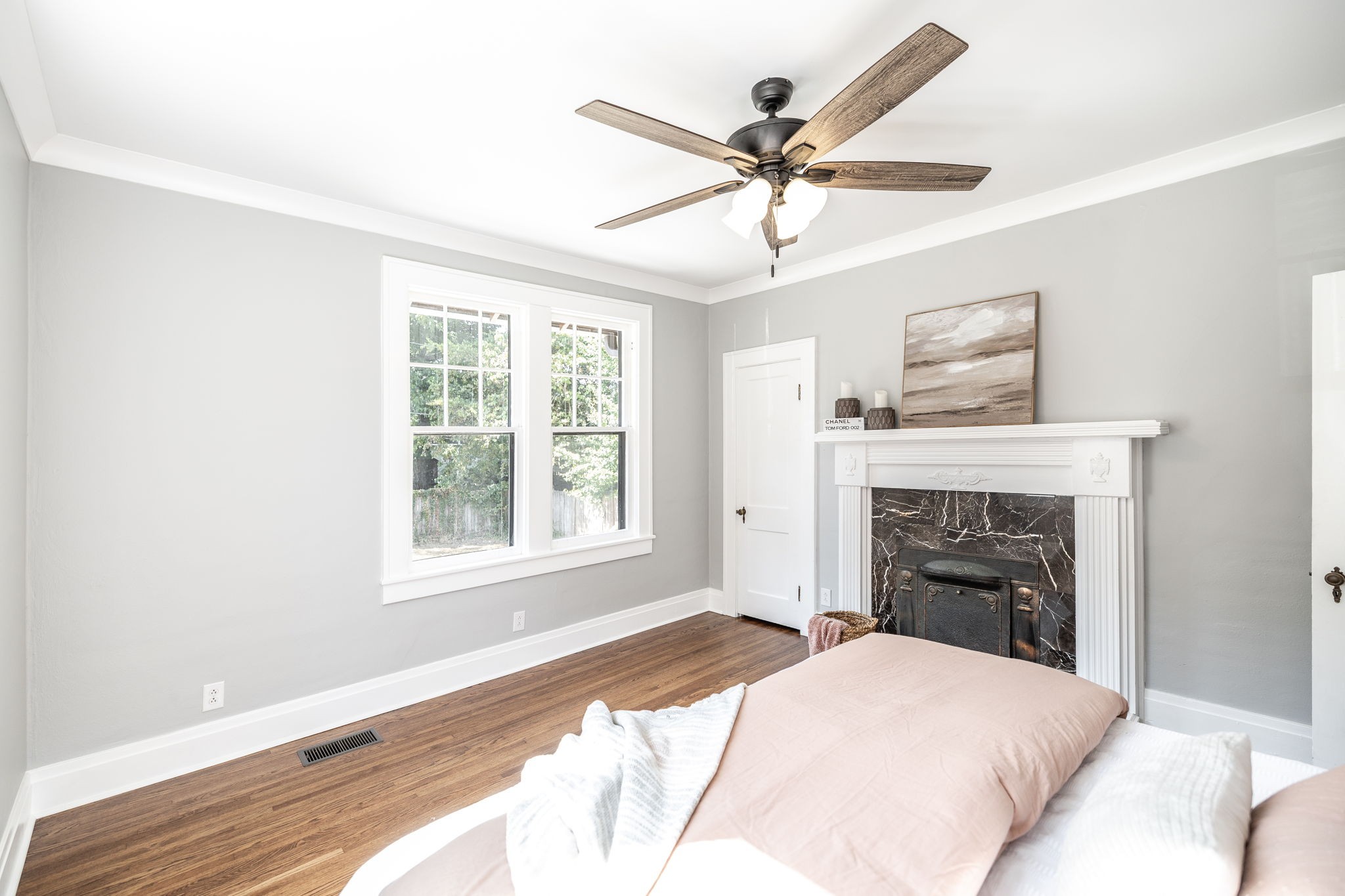 311 North Walnut Street Springfield, TN 37172 - Photo 31 of 79 a bedroom with a bed and a fireplace