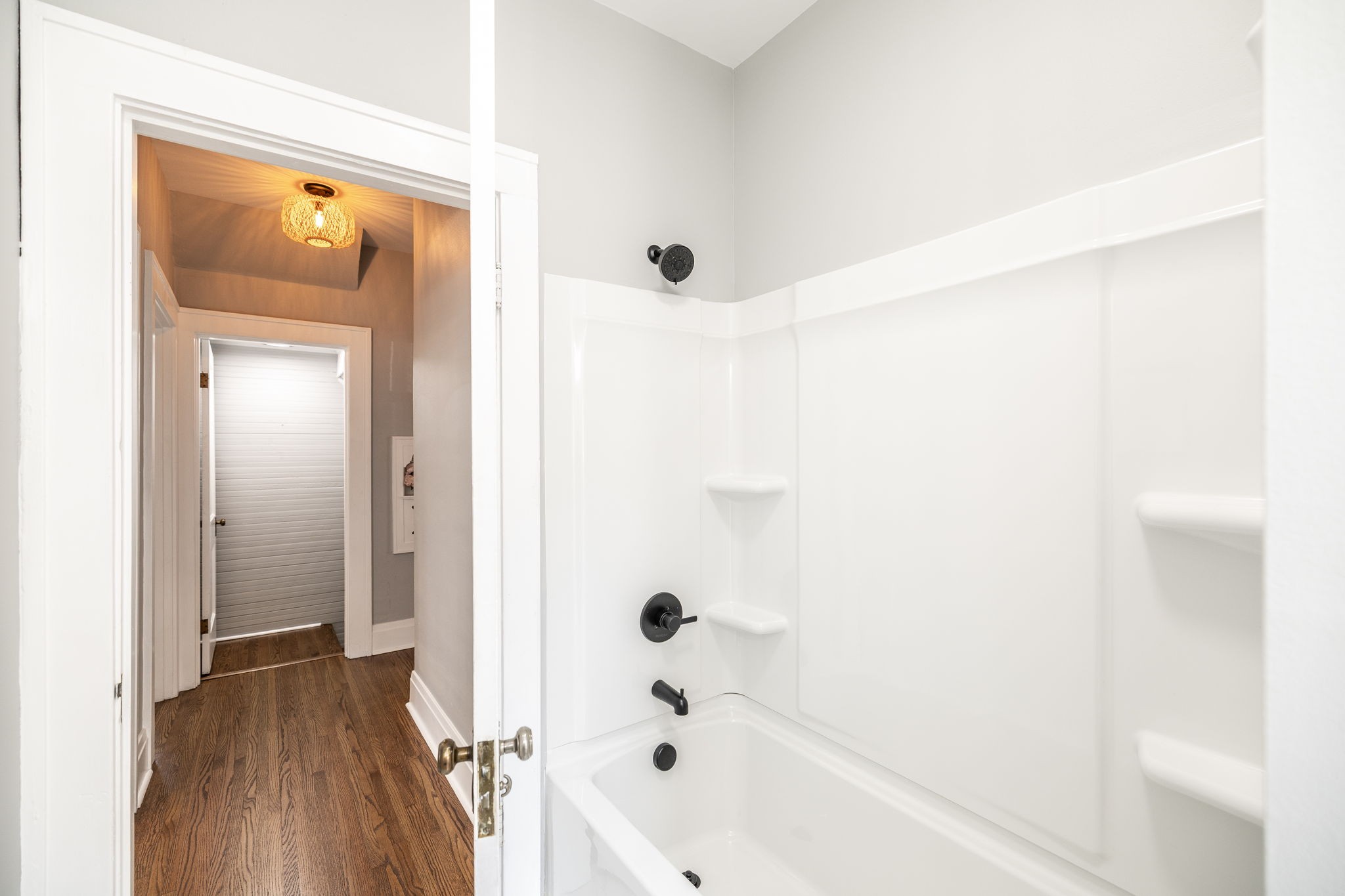 311 North Walnut Street Springfield, TN 37172 - Photo 32 of 79 a bathroom with a bathtub and a shower