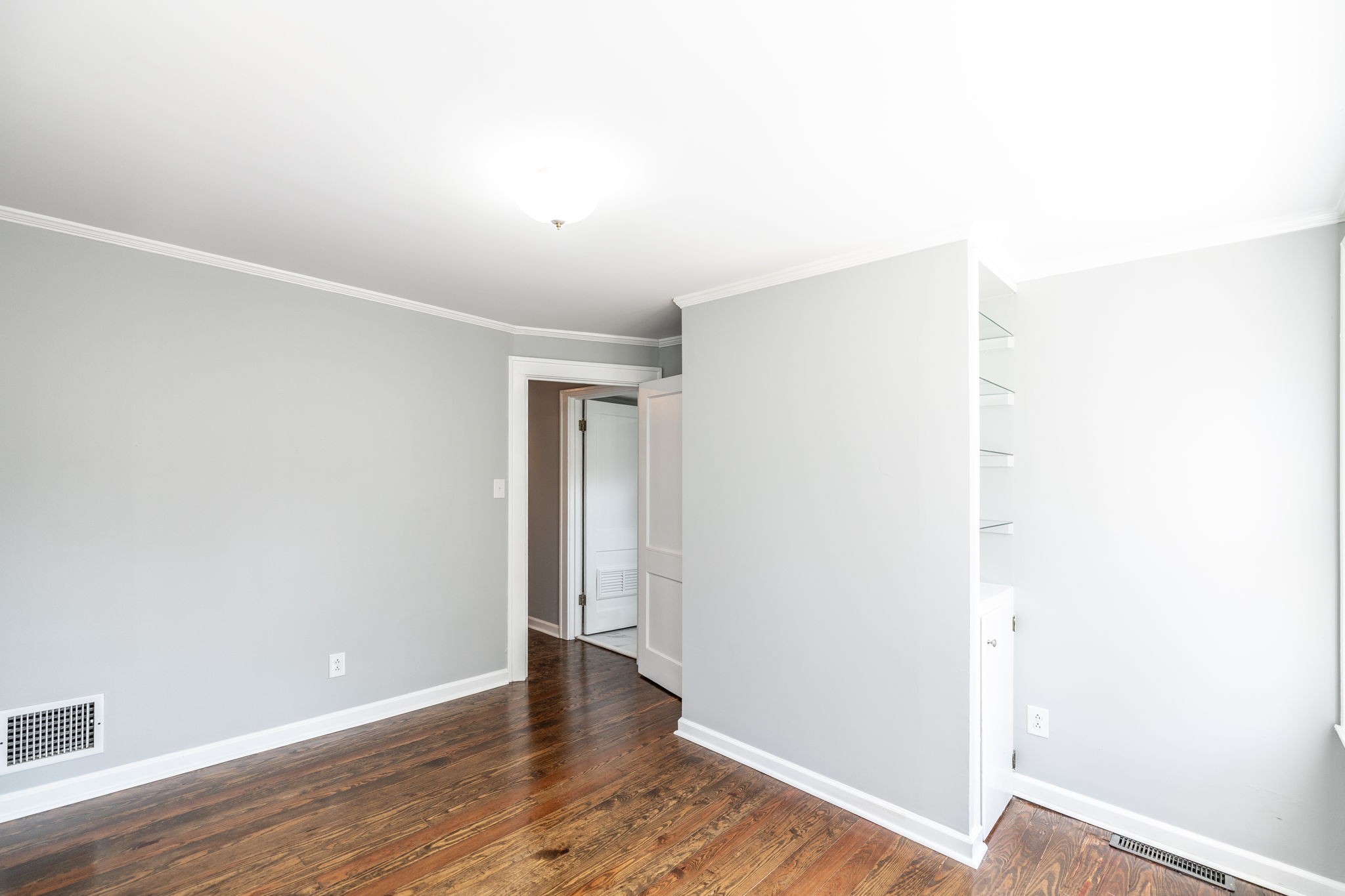 311 North Walnut Street Springfield, TN 37172 - Photo 44 of 79 a view of an empty room with wooden floor