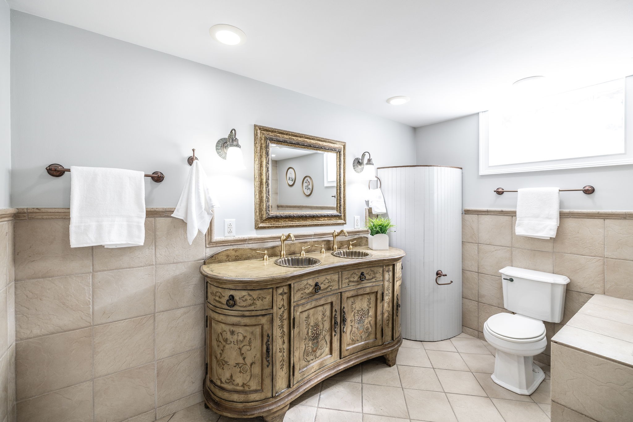311 North Walnut Street Springfield, TN 37172 - Photo 62 of 79 a bathroom with a granite countertop toilet sink and mirror