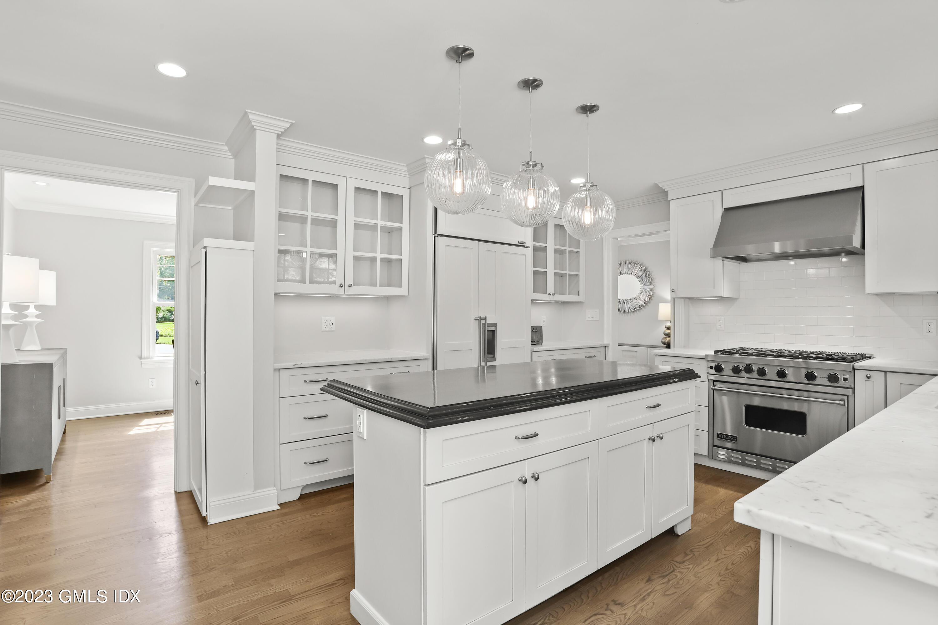 85 Mallard Drive Greenwich, CT 06830 - Photo 11 of 45 a kitchen with kitchen island a sink stainless steel appliances and cabinets