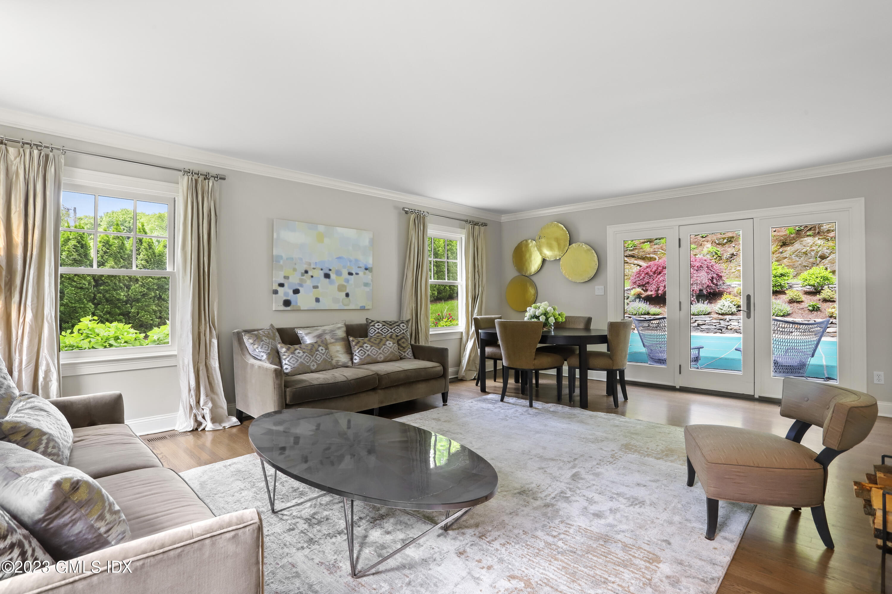 85 Mallard Drive Greenwich, CT 06830 - Photo 13 of 45 a living room with furniture and a large window