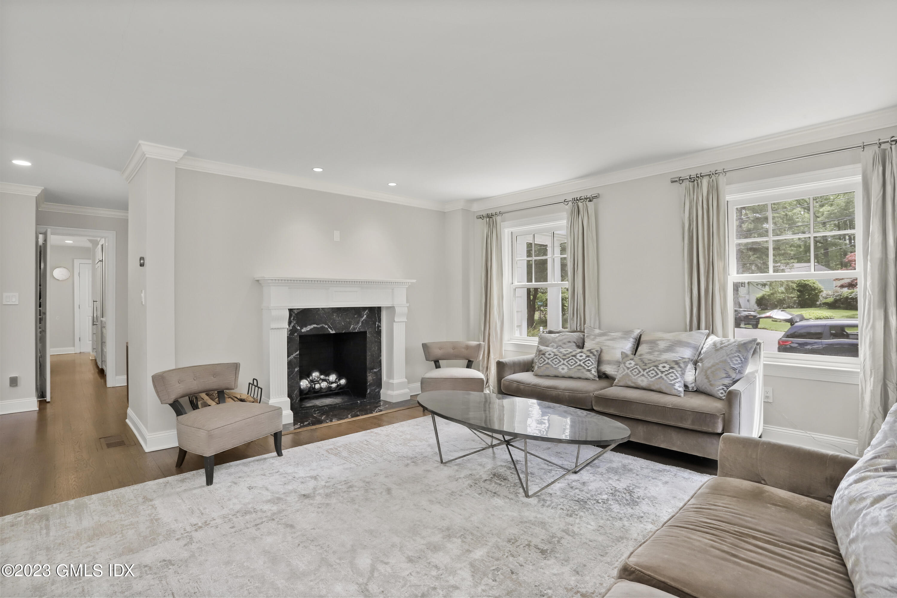 85 Mallard Drive Greenwich, CT 06830 - Photo 14 of 45 a living room with furniture and a fireplace