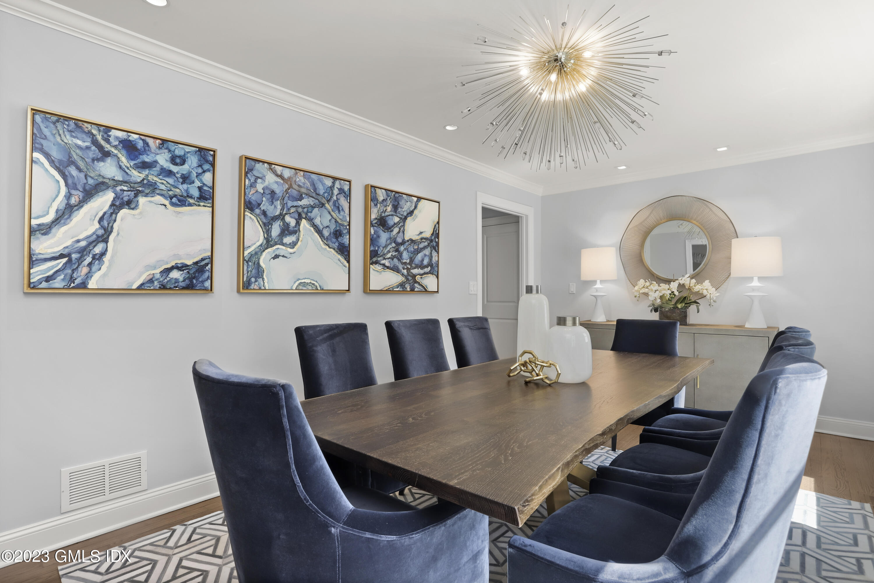 85 Mallard Drive Greenwich, CT 06830 - Photo 15 of 45 a view of a dining room with furniture and wooden floor