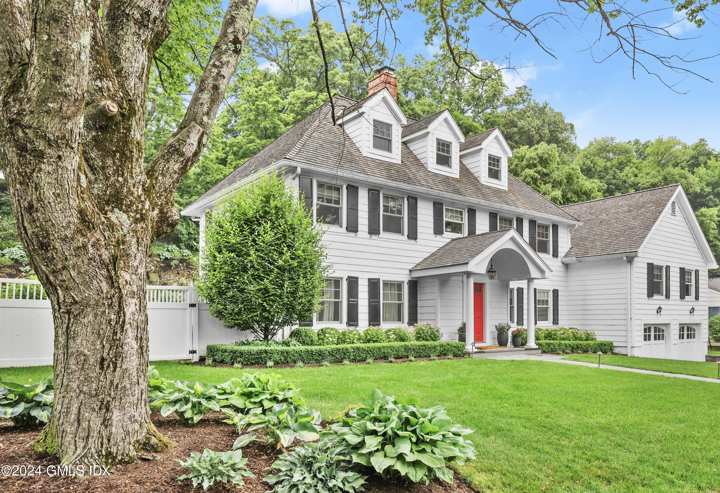 85 Mallard Drive Greenwich, CT 06830 - Photo 2 of 45 front view of a house with a yard