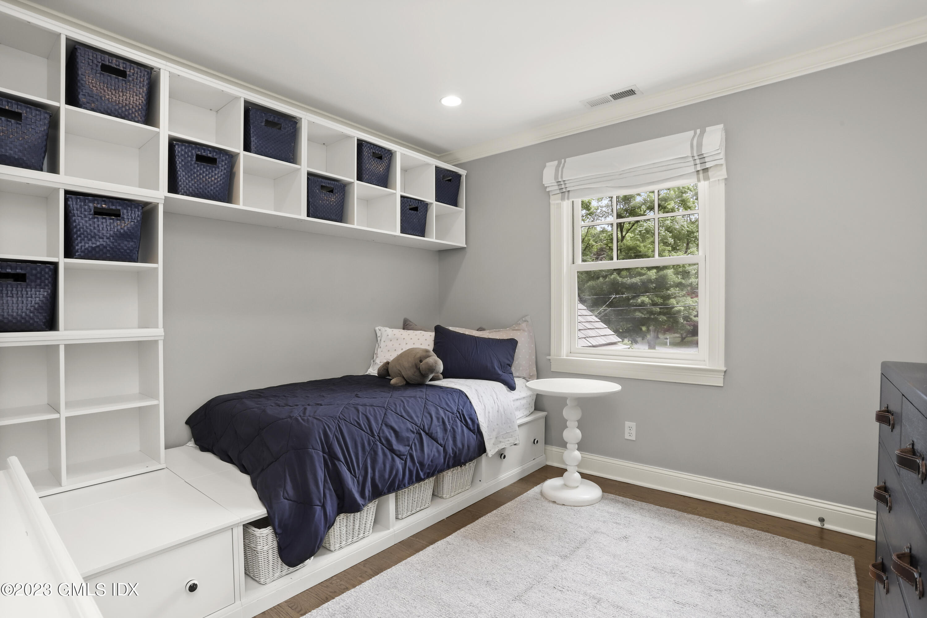 85 Mallard Drive Greenwich, CT 06830 - Photo 28 of 45 a bedroom with a large bed and a window