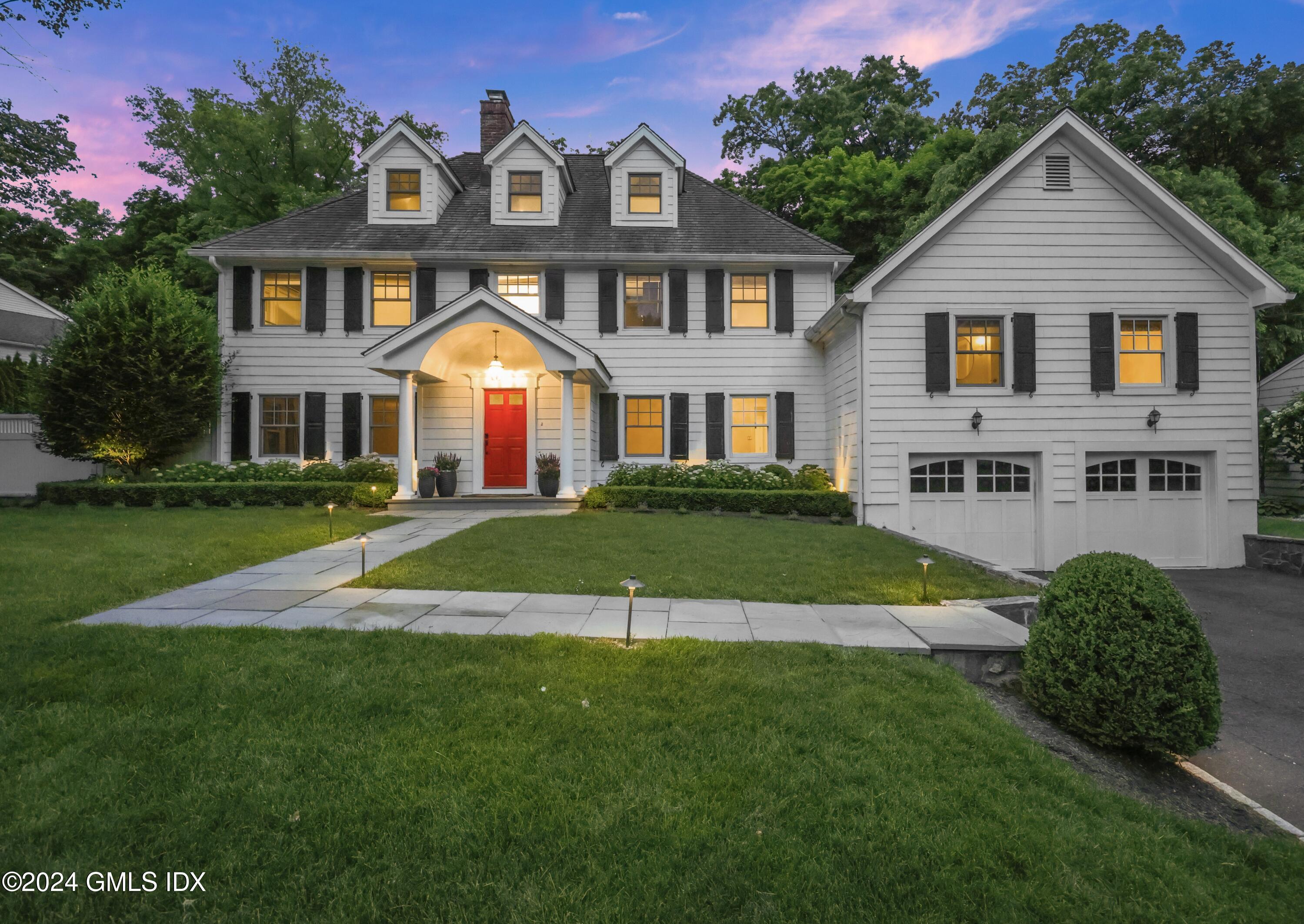 85 Mallard Drive Greenwich, CT 06830 - Photo 33 of 45 a view of house that has a yard