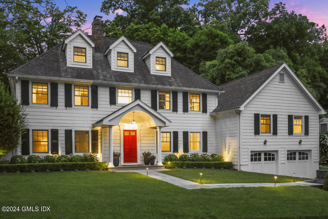 85 Mallard Drive Greenwich, CT 06830 - Photo 34 of 45 a front view of a house with a yard