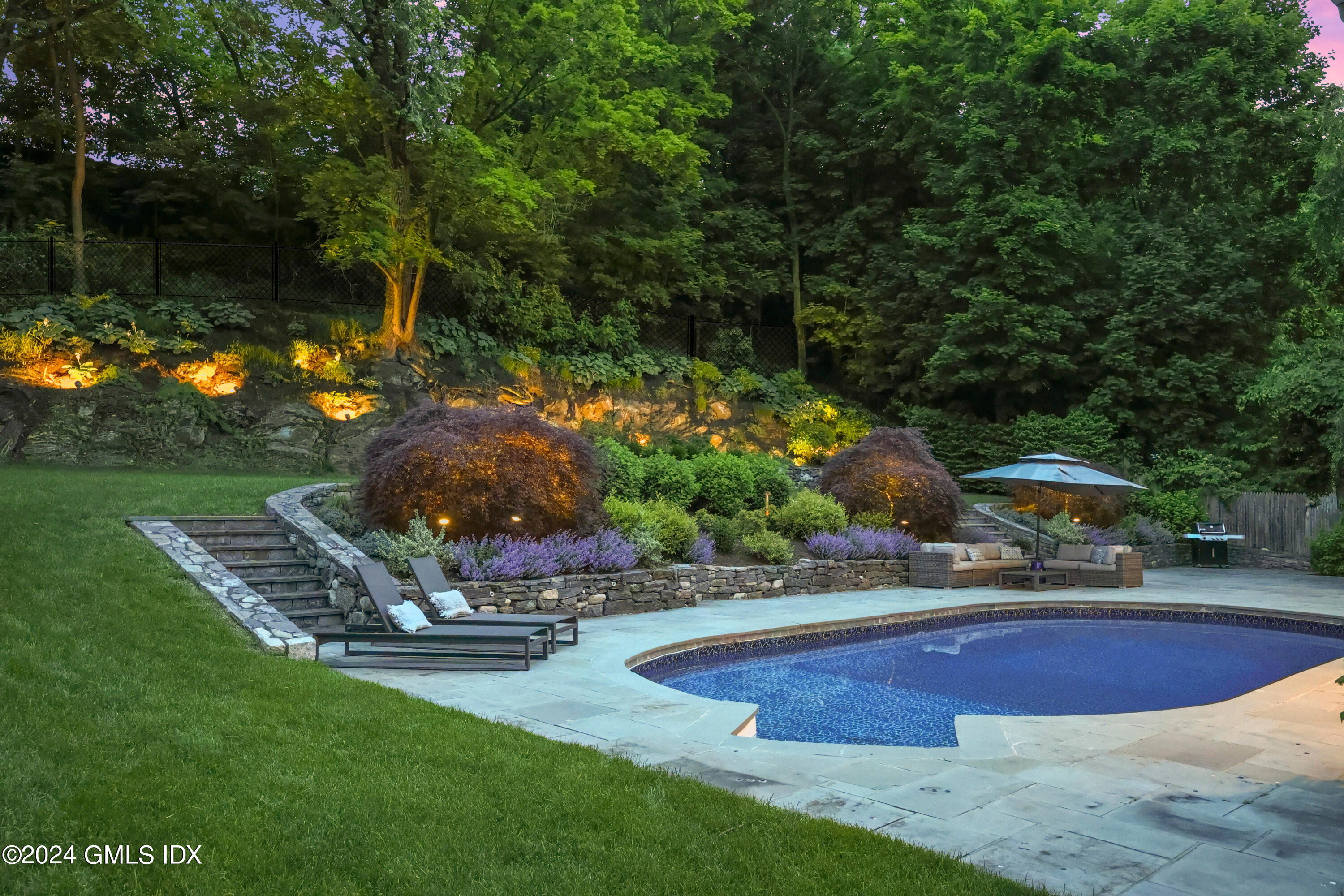85 Mallard Drive Greenwich, CT 06830 - Photo 35 of 45 a view of a swimming pool with a yard