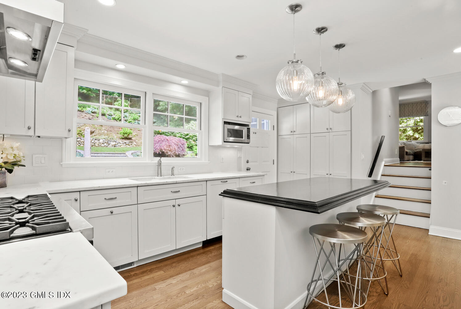 85 Mallard Drive Greenwich, CT 06830 - Photo 9 of 45 a kitchen with stainless steel appliances granite countertop a sink and cabinets
