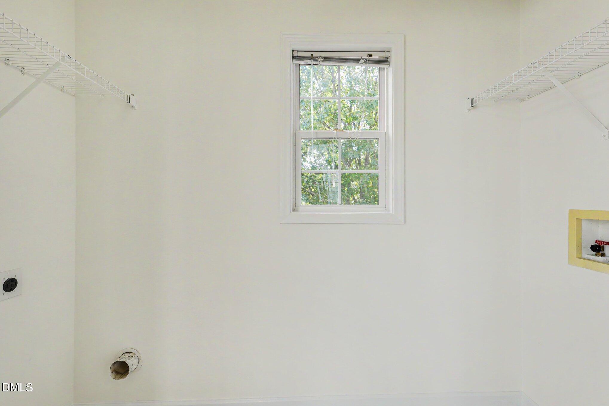 2521 Friedland Place Raleigh, NC 27617 - Photo 10 of 21 Dedicated interior laundry room with built-in hookups. Offers out-of-sight utility storage for cleaning supplies, ironing, or hampers.