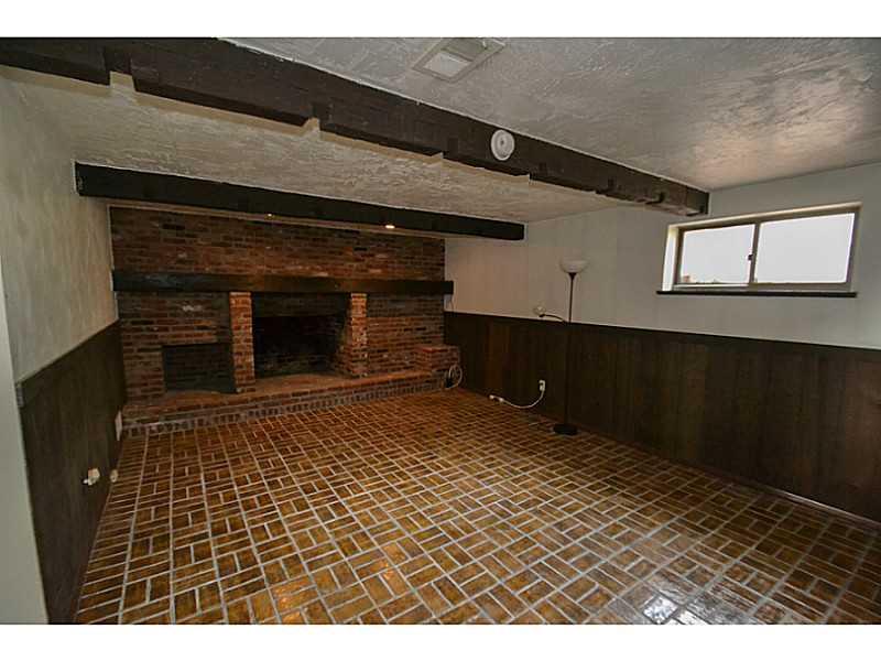 68 Maplewood Road Pittsburgh, PA 15209 - Photo 18 of 24 Den/Family/Great Room. Large game room with a full brick fireplace.