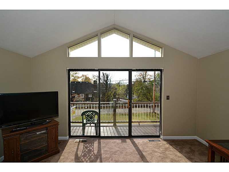 68 Maplewood Road Pittsburgh, PA 15209 - Photo 6 of 24 Living Room. View of balcony. Sliding glass doors.