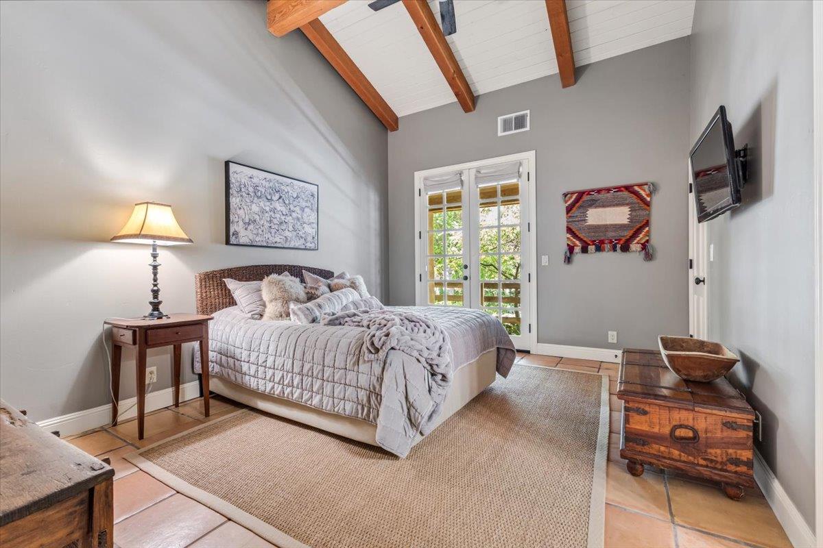 2727 Thomas Road Hollister, CA 95023 - Photo 56 of 83 a bedroom with a bed and flat screen tv