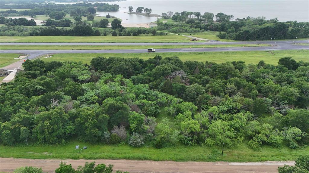 102 Lakeview Trail Mabank, TX 75147 - Photo 2 of 6 a view of an outdoor space and a lake view