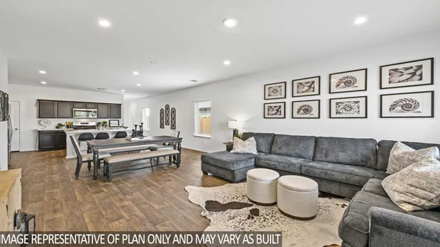 a living room with furniture and a couch