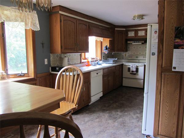 33 Harbey Road West Springfield, MA 01089 - Photo 8 of 29 a kitchen with stainless steel appliances granite countertop a stove a sink and a refrigerator