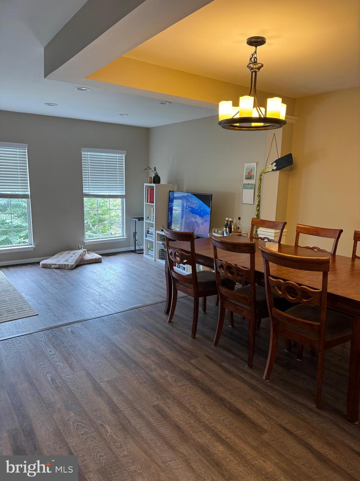 20691 Southwind Terrace Ashburn, VA 20147 - Photo 7 of 16 a view of a dining room with furniture and chandelier