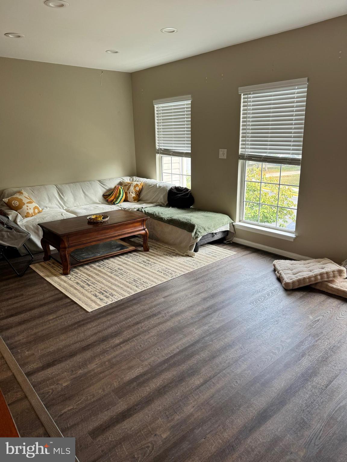 20691 Southwind Terrace Ashburn, VA 20147 - Photo 8 of 16 a living room with furniture and a window