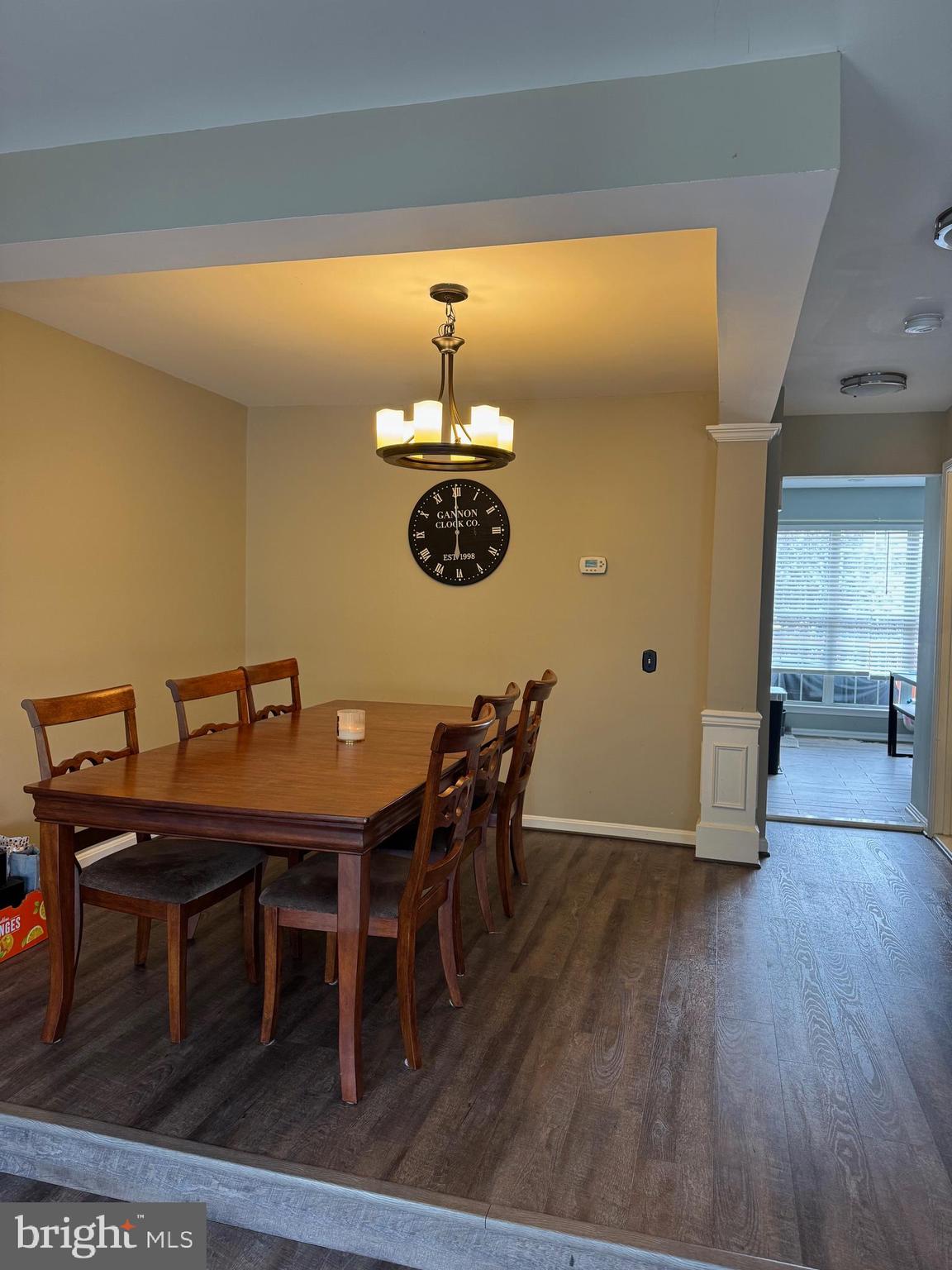 20691 Southwind Terrace Ashburn, VA 20147 - Photo 9 of 16 a view of a dining room with furniture and wooden floor