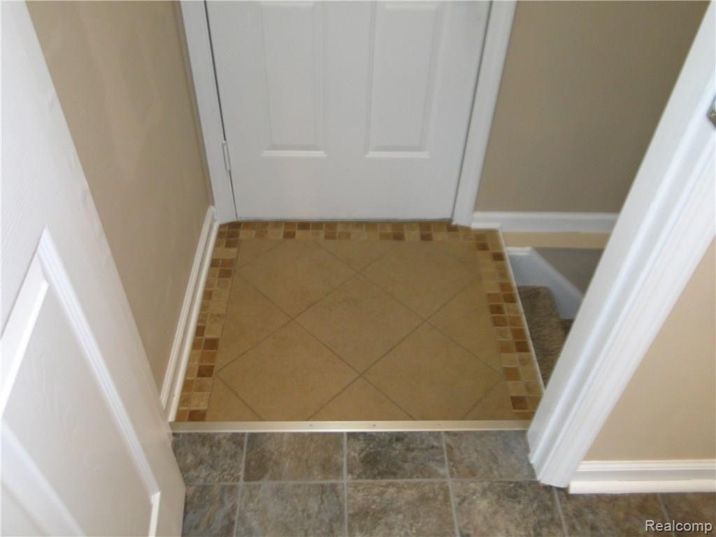 5090 Mt Morris Road Columbiaville, MI 48421 - Photo 31 of 41 Custom Tile.JPG
