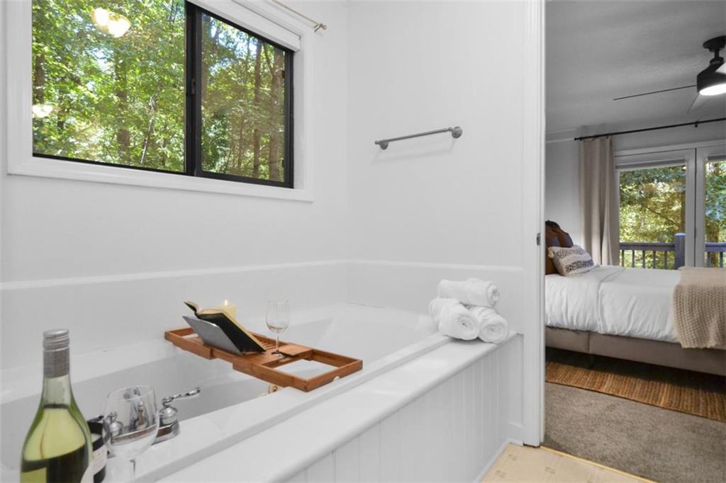 223 Mango Circle Ellijay, GA 30540 - Photo 25 of 43 a bedroom with a bed and a window