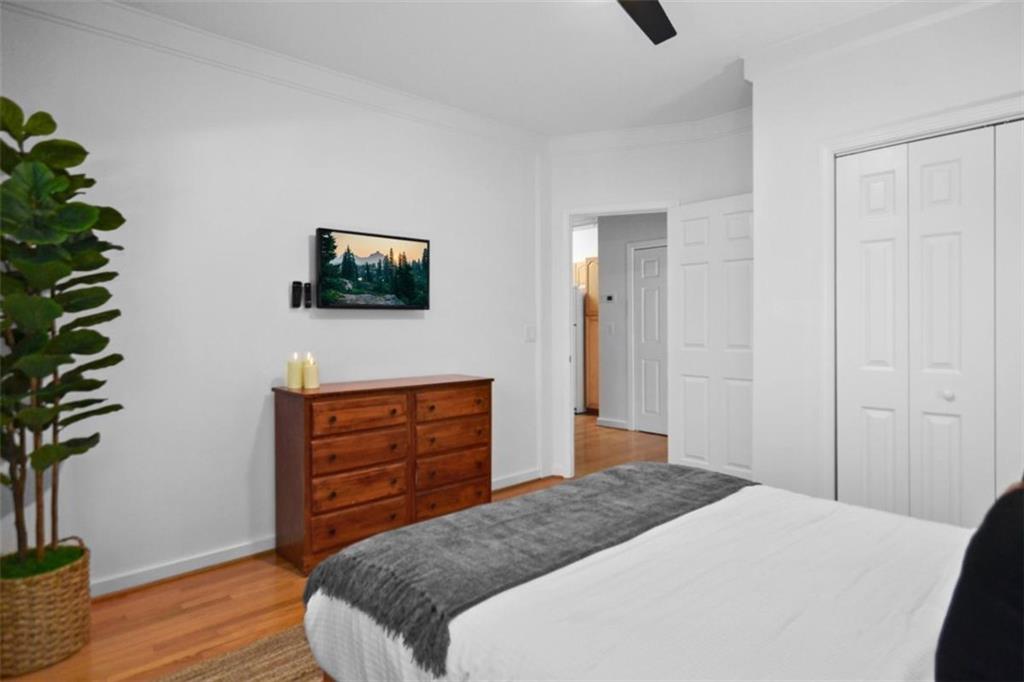 223 Mango Circle Ellijay, GA 30540 - Photo 36 of 43 a bedroom with a bed and a potted plant