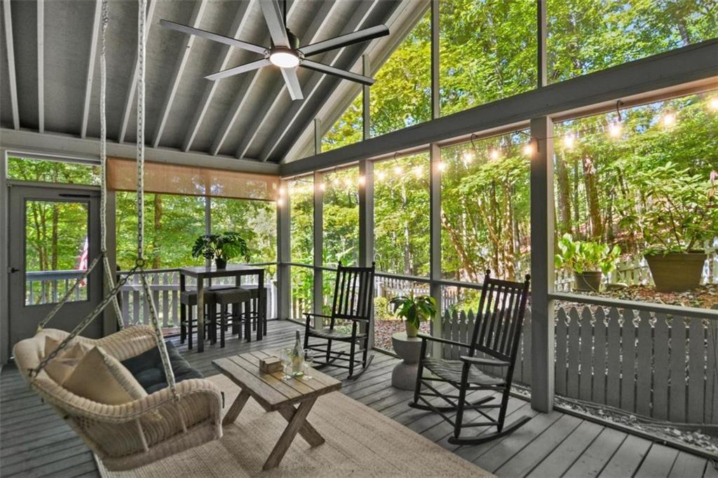 223 Mango Circle Ellijay, GA 30540 - Photo 41 of 43 a balcony with furniture and wooden floor