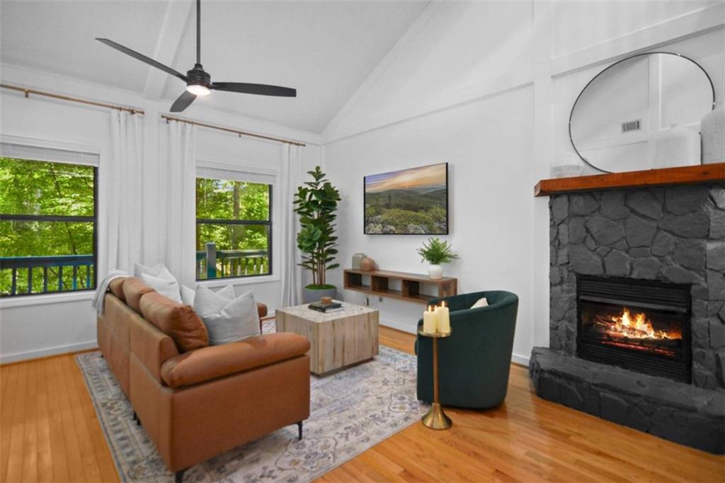 223 Mango Circle Ellijay, GA 30540 - Photo 6 of 43 a living room with furniture a window and a fireplace