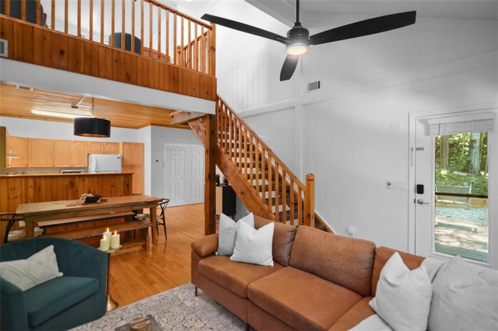 223 Mango Circle Ellijay, GA 30540 - Photo 7 of 43 a living room with furniture and a wooden floor