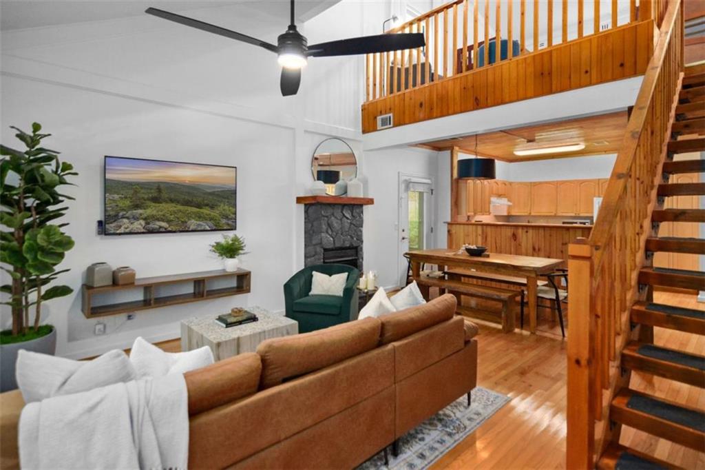 223 Mango Circle Ellijay, GA 30540 - Photo 9 of 43 a living room with furniture and a fireplace