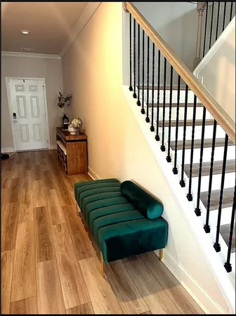 a view of entryway with wooden floor