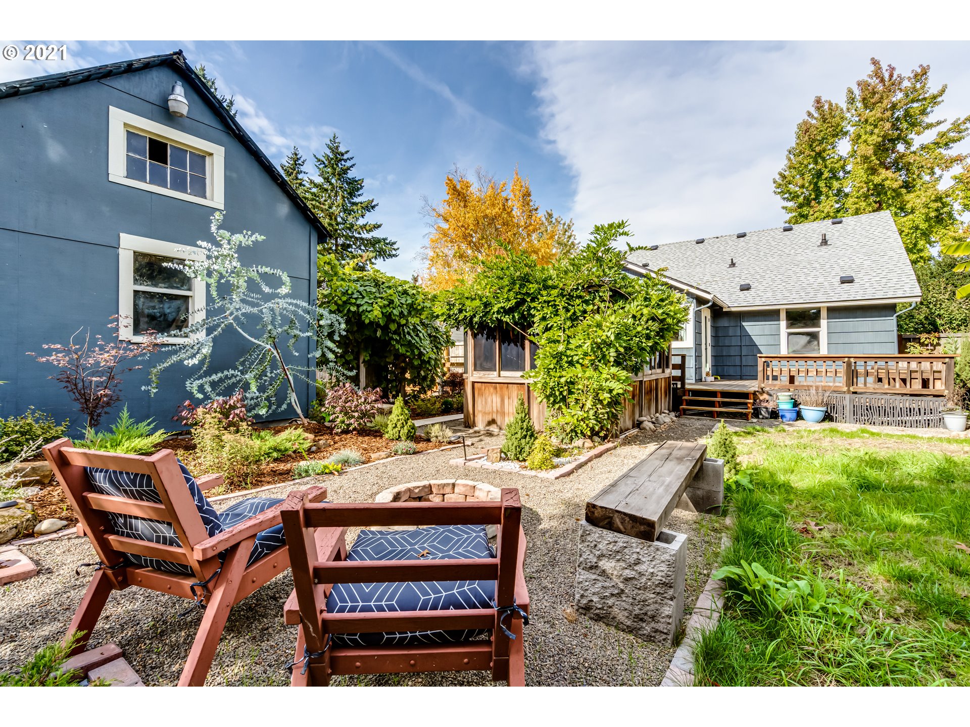 1327 E Street Springfield, OR 97477 - Photo 26 of 32 a view of an house with backyard and sitting area