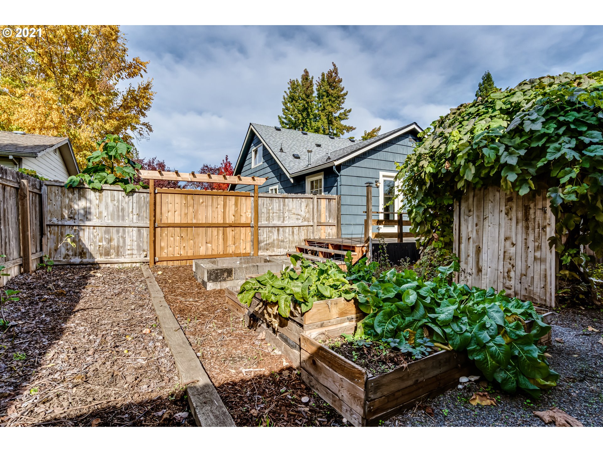1327 E Street Springfield, OR 97477 - Photo 28 of 32 a view of a garden with a chair