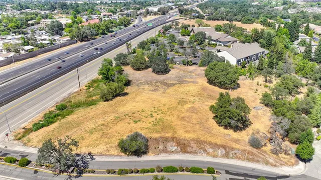 a view of a backyard of the house