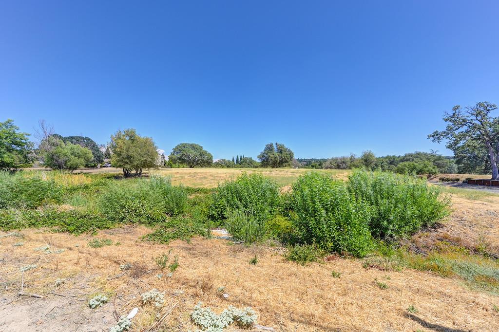5500 China Garden Road Rocklin, CA 95677 - Photo 20 of 43 a view of a lake with a yard