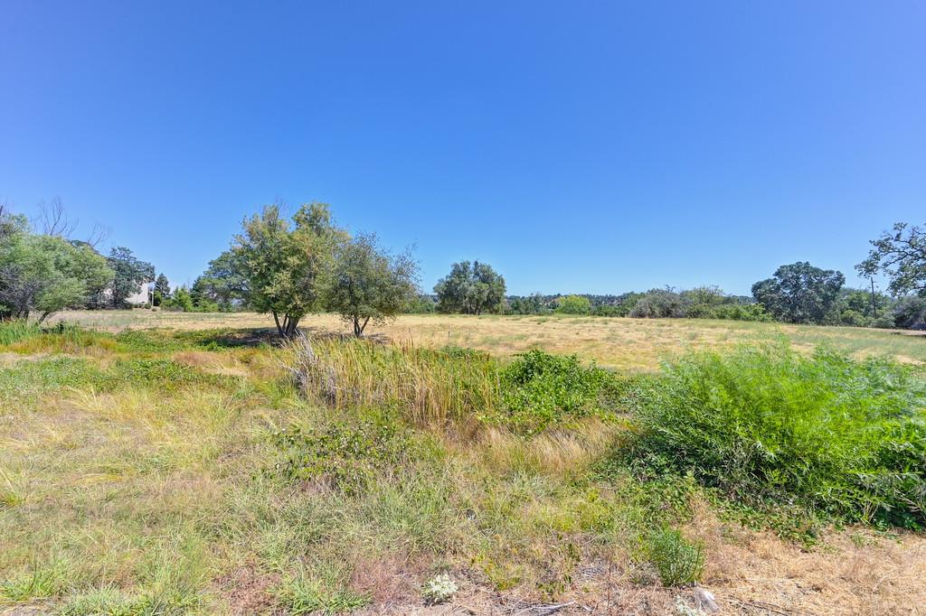 5500 China Garden Road Rocklin, CA 95677 - Photo 25 of 43 a view of a lake with houses in the background