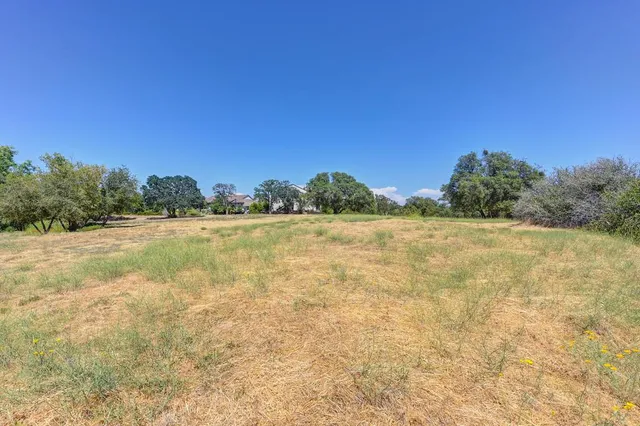 a view of a swimming pool and an outdoor space
