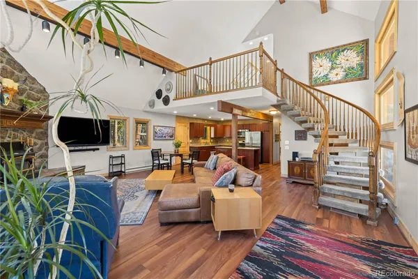 a outdoor space with patio couch and wooden floor