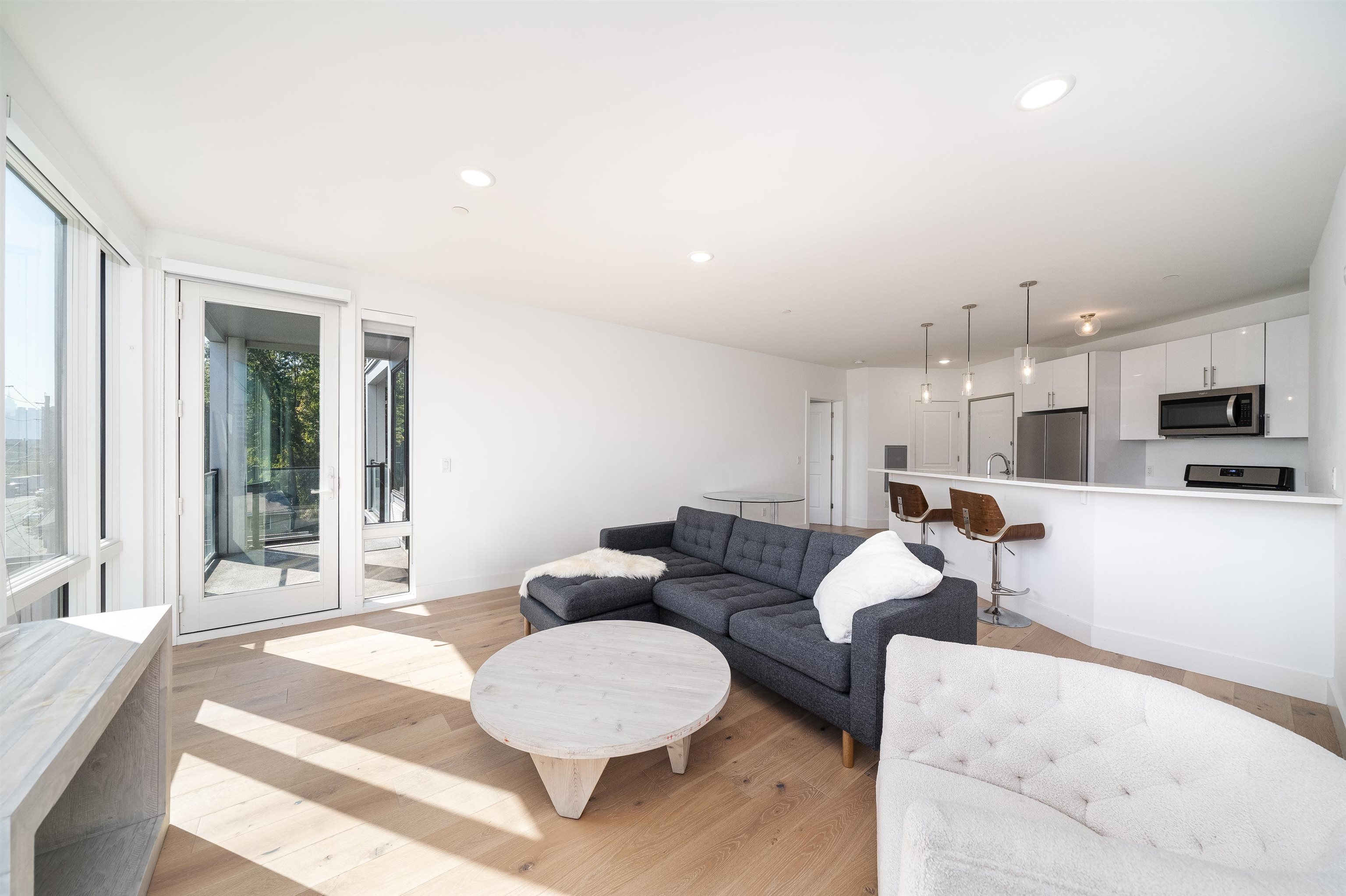8621 River Road, Unit 4A North Bergen, NJ 07047 - Photo 18 of 42 a living room with furniture and a large window