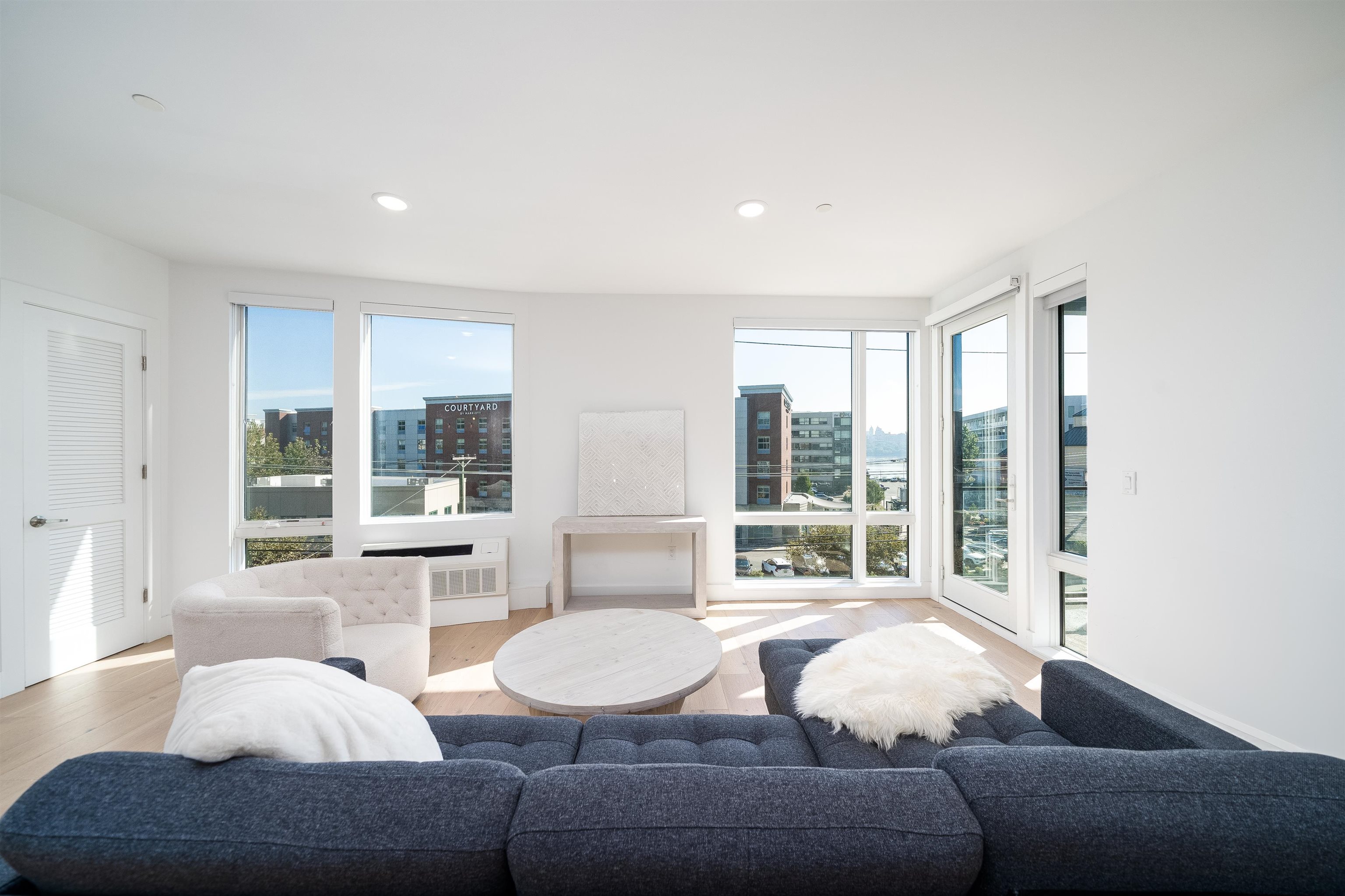 8621 River Road, Unit 4A North Bergen, NJ 07047 - Photo 20 of 42 a living room with furniture and a large window