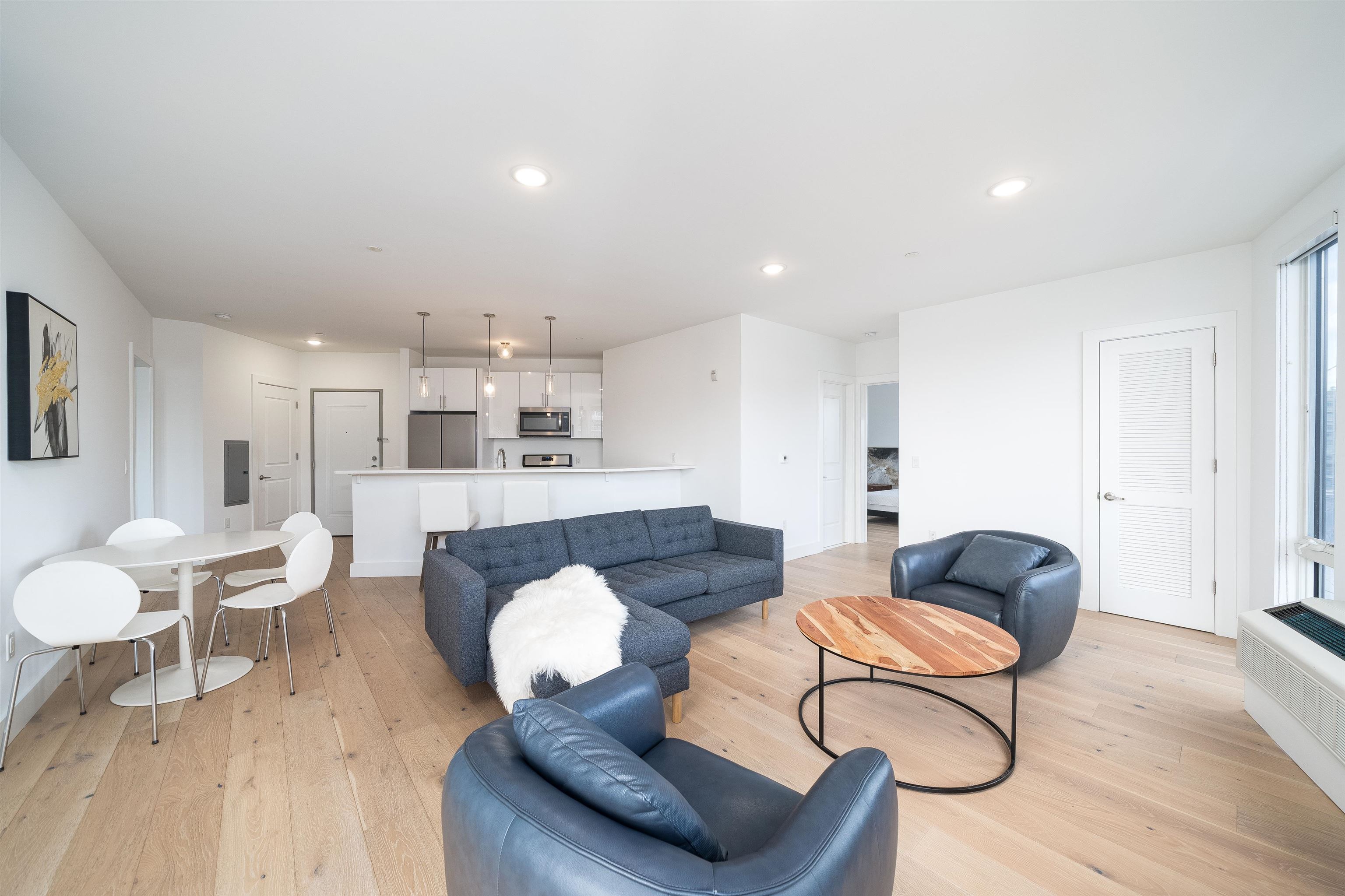 8621 River Road, Unit 4A North Bergen, NJ 07047 - Photo 2 of 42 a living room with furniture and wooden floor