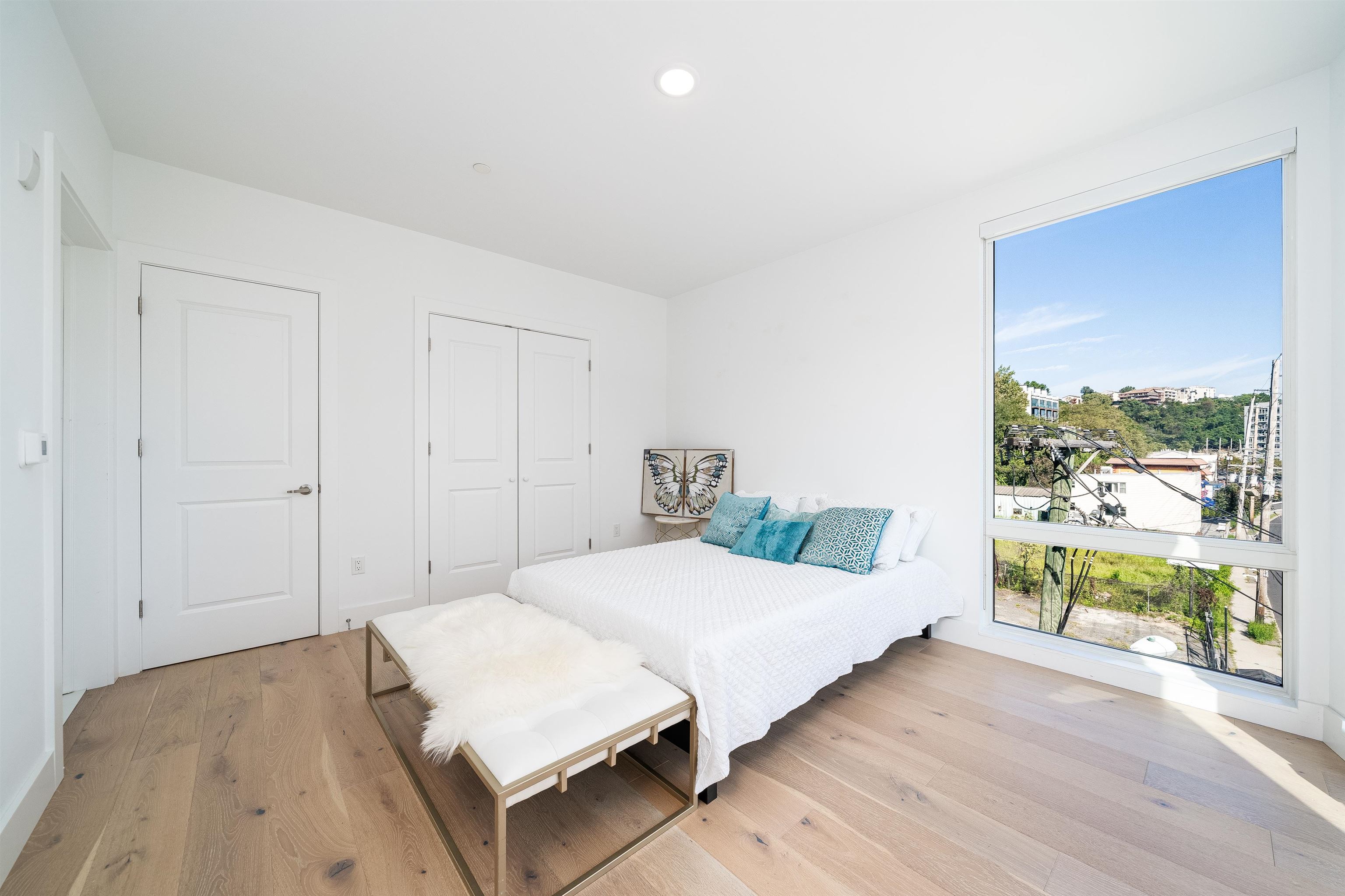 8621 River Road, Unit 4A North Bergen, NJ 07047 - Photo 23 of 42 a bedroom with a bed and a large window