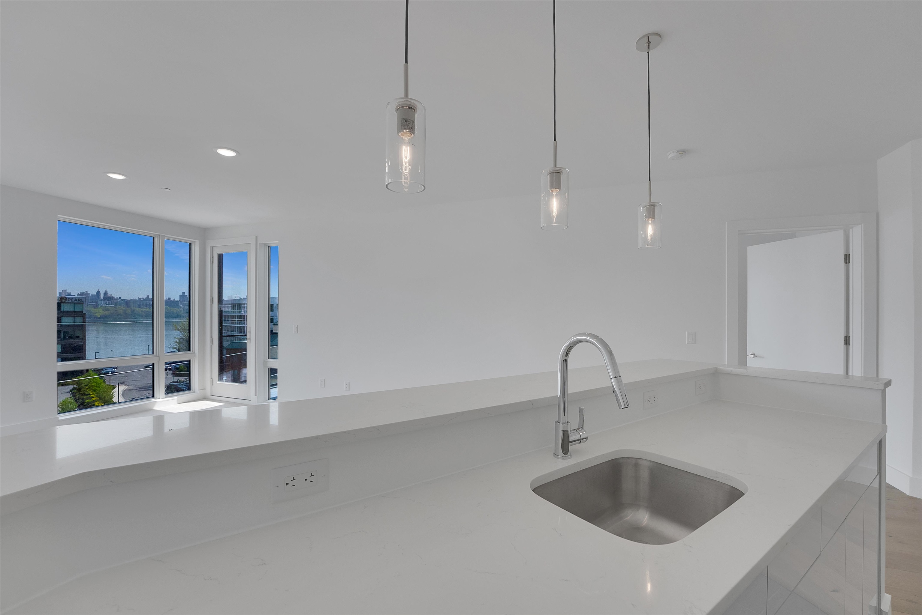 8621 River Road, Unit 4A North Bergen, NJ 07047 - Photo 27 of 42 a bathroom with a sink and a large window
