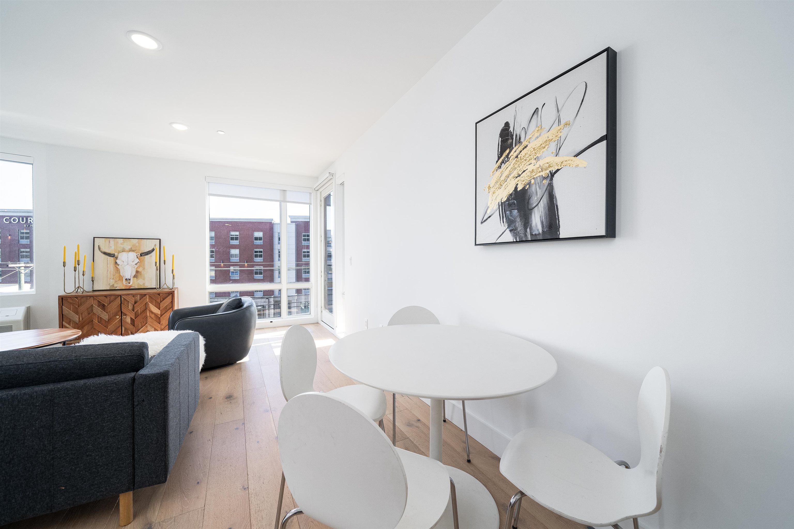 8621 River Road, Unit 4A North Bergen, NJ 07047 - Photo 3 of 42 a living room with furniture and a painting on the wall