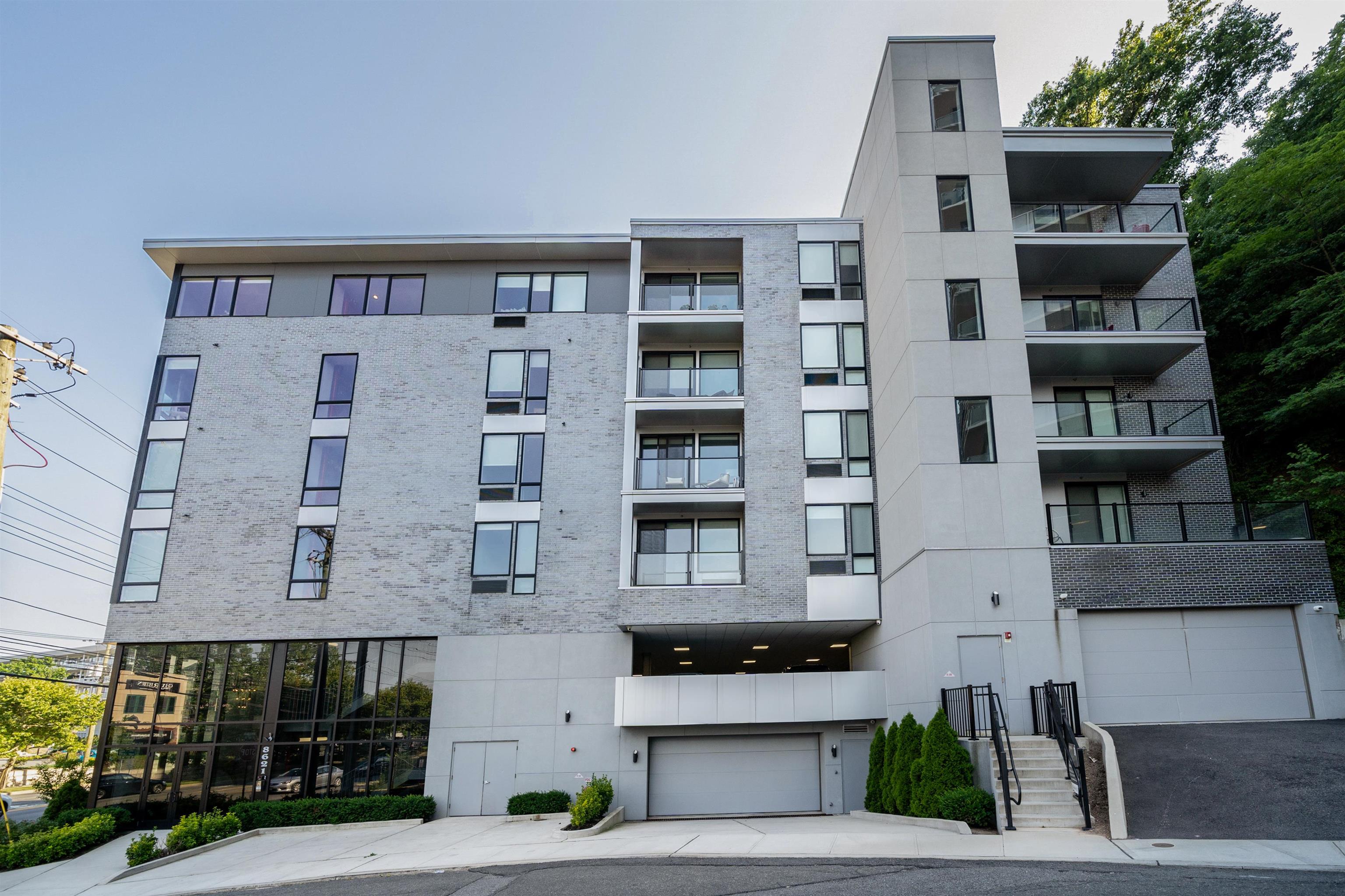 8621 River Road, Unit 4A North Bergen, NJ 07047 - Photo 42 of 42 a front view of a building with a street