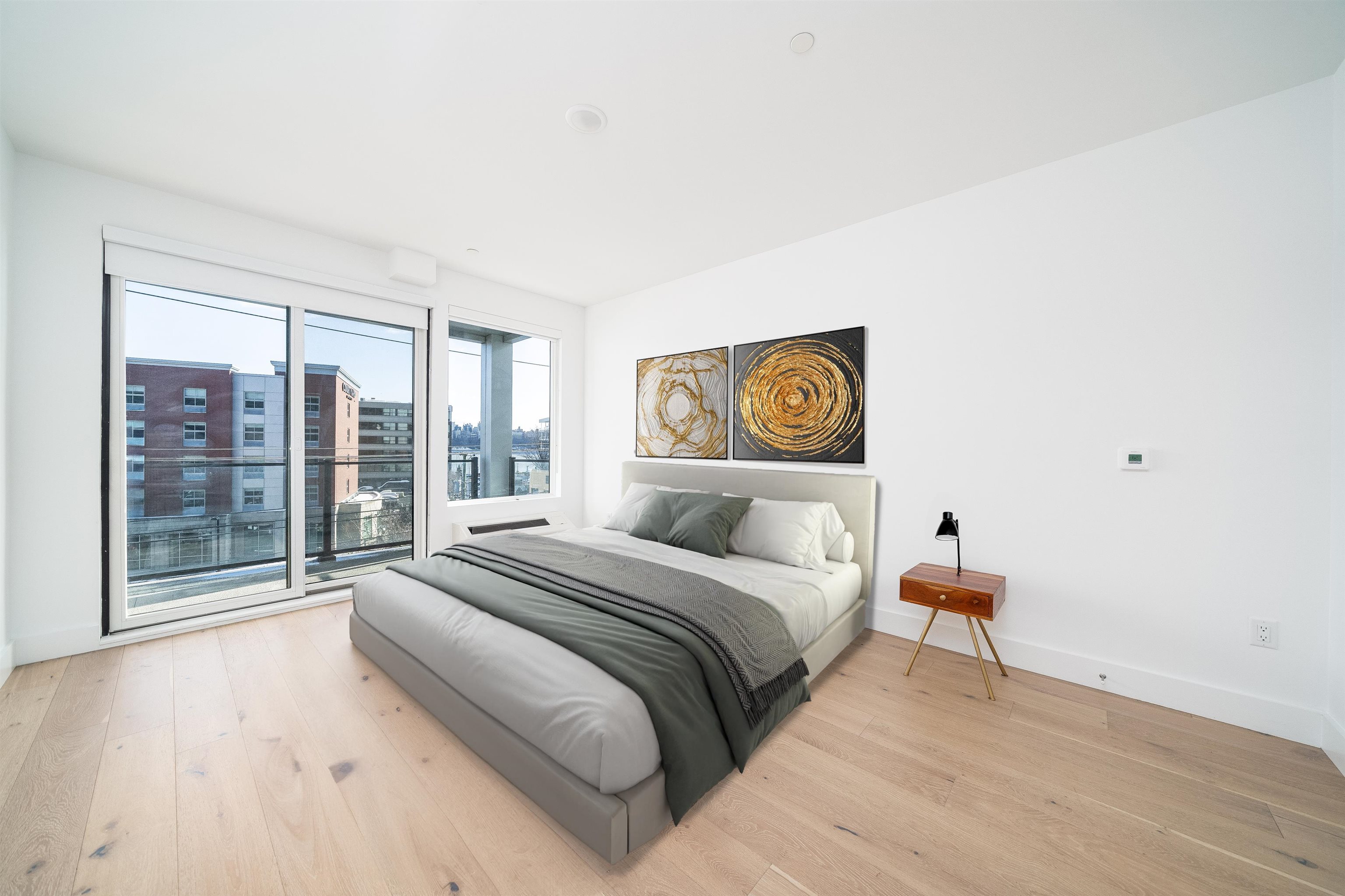 8621 River Road, Unit 4A North Bergen, NJ 07047 - Photo 5 of 42 a bedroom with a bed and a large window