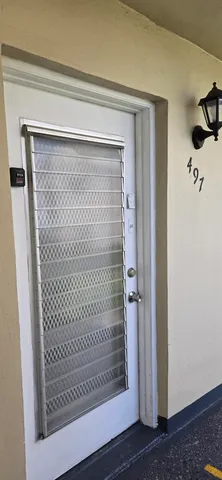 a bathroom with a glass door